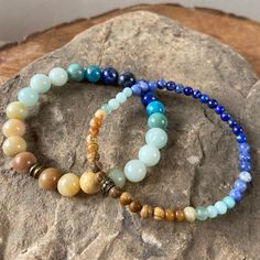 Want to be reminded of the beach and ocean even if you can't actually be there? This is like wearing the beach on your wrist! Zodiac Signs: Virgo, Gemini, Libra, Sagittarius, Leo, and Taurus. Chakras: Root, Throat, Crown, Third Eye, Sacral, and Heart. Handmade with authentic crystals & gemstones in Minneapolis, MN. 8mm Beaded Bracelets, Gemstone Accessories, Lapis Bracelet, Zodiac Signs Virgo, Orange Carnelian, Beads Bracelets, Chakra Jewelry, Beaded Bracelets Diy, Bead Bracelets