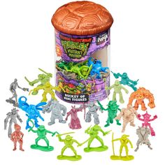 teenage mutant ninjas mini figures are in front of a canister with the lid open