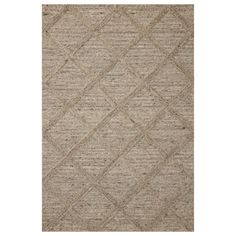 a beige rug with diamond shapes on it