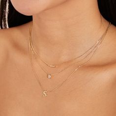 Simple, classic, gold. Everyone needs an initial necklace! This classic style pairs well with just about anything. Wear it by itself or layer it with other styles to really elevate & personalize your look. Made with 925 recycled sterling silver and plated with fine 14k gold for a brilliant shine and luxurious feel. We finish all of our sterling silver jewelry with a specialized coating to help prevent tarnishing and add longevity to your favorite piece. Our chains measure 16" with a 3" extender Classic Gold Initial Necklace With Delicate Chain, Gold Classic Initial Necklace With Delicate Chain, Classic Clavicle Chain Initial Necklace, Classic Initial Necklace With Delicate Chain, Classic Gold Name Necklace For Everyday, Fine Jewelry Initial Pendant Necklace For Everyday, Initial Pendant Necklace With Delicate Chain For Layering, Classic Everyday Initial Pendant Jewelry, Everyday Diamond Initial Pendant Necklace