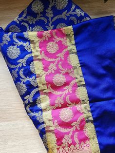 "Color: Royal Blue Dupatta with Rani Pink Border Beautiful Indian katan silk dupatta with golden handweaving. The intricate floral handwoven design adds an incredibly royal and elegant look. The design on this Indian dupatta/stole is inspired by the vintage raw silk Indian dresses. The fabric is organically rich and luxurious to feel and is one of a kind. This dupatta can be paired with simple as well as designer outfits. You can wear it with gold jewelry or matching jewelry to complete the trad Benarasi Dupatta, Indian Dupatta, Designer Dupatta, Western Style Dresses, Blue Dupatta, Sequence Saree, Rani Pink, Pink Border, Indian Look