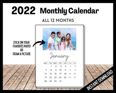 a calendar with an image of two people on it and the date for each month