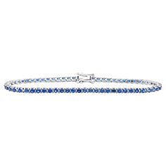 Evert asked the judge to pause the match so she could search for her bracelet. After reluctantly granting her request, the judge impatiently waited along with fans and her opponent while Evert searched for the jewelry piece. From that moment, the classic diamond jewelry piece became known as a "tennis bracelet.” Taking inspiration from the above event, a majestic 2.5 carat vivid blue soothing sapphire is set in this classical bracelet in 18K setting. The bracelet is hand made in Hong Kong. The s Blue Hand Set Fine Jewelry Bracelet, Blue Fine Jewelry Bracelet Hand Set, Blue Diamond Bracelet With Hand Set Stones, Blue Hand Set Round Diamond Bracelet, Blue Hand Set Diamond Bracelet, Blue Bangle Tennis Bracelet For Formal Occasions, Blue Jubilee Bangle Tennis Bracelet, Classic Diamond Jewelry, Blood Ruby