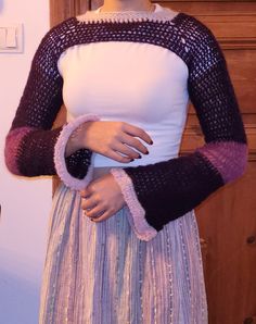 this one is a mohair and alpaca blend shruggie i made. It is super comfortable and keeps youvery warm. You can choose any color that you like for it to be made with. One Size Open Knit Shrug For Winter, Crochet Stretch Sweater For Winter, Winter Crochet Stretch Sweater, Fitted Crochet Long Sleeve Shrug, Fitted Long Sleeve Crochet Shrug, Bohemian Fitted Shrug For Winter, Shrug Crochet, Crochet Sleeves, Crochet Shrug