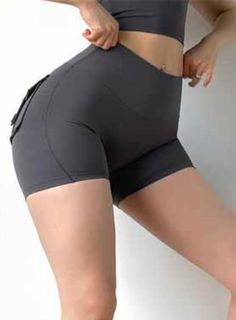 Material:95%Polyester+5%Spandex -Comfy and stylish, enjoy this Yoga Shorts all summer long. They have a high-waist, and give you a comfortable fit thanks to its elasticity.  -Keep your valuables secure with the fashionable and breathable side pockets that are roomy enough to put your essentials. The cute and practical design gives you a feel of wearing shorts underneath your clothes as if you`re not wearing anything. -You'll love the comfortable material, high waist and pockets of our Summer Hig Workout Pants Women, Fitness Shorts, Women's Workout, Fitness Apparel, Sports Running, Everyday Bra, Womens Workout Outfits, Fitness Yoga, Short Waist