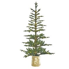 a small christmas tree in a gold vase