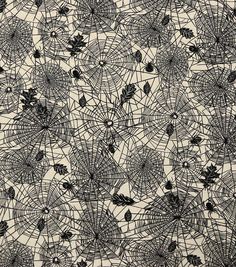 black and white drawing of spider webs with leaves on them, all over a beige background