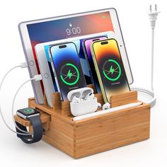 an electronic device charging in a wooden holder