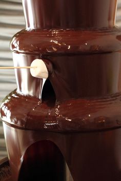 the chocolate fountain is ready to be eaten