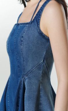 Step into effortless elegance with the Halter Neck Pleated Denim Dress. This stunning piece features a flattering halter neckline and intricate pleats that flow gracefully, creating a beautiful silhouette. The denim fabric offers a casual yet chic vibe, making it perfect for both daytime outings and evening events. Pair it with sandals for a laid-back look or dress it up with heels and accessories for a more sophisticated style. ■ Size Size(cm) Length Bust Waist 裾Width S 84 82-85 66-69 360 M 85 Sleeveless Stretch Denim Dress In Medium Wash, Stretch Medium Wash Sleeveless Denim Dress, Medium Wash Stretch Sleeveless Denim Dress, Elegant Sleeveless Denim Dress For Summer, Elegant Sleeveless Summer Denim Dress, Chic Stretch Denim Blue Dress, Chic Stretch Denim Spring Dress, Chic Stretch Denim Dress For Spring, Elegant Sleeveless Denim Mini Dress