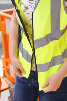 We're so excited to finally launch this product that so many of you have been asking for. This ANSI Class 2 safety vest was designed with women in mind, with thoughtful features like a comfortable fit, breathable mesh, and extended hem coverage. It's also water and stain-repellent, so you can work hard without worrying about getting dirty. Plus, it's machine-washable, so it's easy to keep clean. So Excited