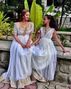 Experience the understated elegance of this modern Ethiopian Habesha dress, designed with a simple yet captivating silhouette. Its clean lines and exquisite craftsmanship create a beautiful and sophisticated look. Perfect for both casual and formal occasions, this dress is a versatile addition to any wardrobe and a testament to the timeless artistry of Ethiopia. Material Cotton Menen Thread Estimated delivery : 2 weeks to 3 weeks Contact WhatsApp +1(304)-306-2784Email: contact@ethiopian.store White Flowy Dress For Festive Occasions, White Flowy Festive Dress, Flowy Midi Dress For Wedding Guest, Festive Flowy White Dress, Festive White Flowy Dress, Festive Elegant Maxi Dress, Elegant Short Sleeve Dresses For Eid, Festive Flowy Maxi Dress For Wedding, Flowy Maxi Dress For Wedding Festivities