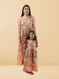 Match style with your little one in our Mommy n Me - Cream Kalankari Print Length Dresses. These charming matching dresses feature a beautiful cream Kalankari print, designed for both mothers and daughters to flaunt together. The comfortable length and soft fabric ensure a perfect fit and ease of movement, ideal for creating lasting memories with your mini-me. Care Instructions: Hand wash in cold water to retain the vibrant print and fabric quality for both dresses. Dresses For Mom And Daughter, Mom And Daughter Matching Outfits, Mothers And Daughters, Mom And Daughter Matching, Mommy And Me Dresses, Mom And Daughter, Indian Ethnic Wear, Mini Me, Matching Dresses