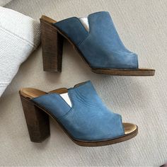 Bought These At A Designer Consignment Store Years Ago And Have Only Worn 3-4 Times So I’m Hoping They Go To A Good Home. Mm6 Sky Blue Wooden Heels. Silver Bottoms, Iconic. 37 Or Us 6.5/7. Heel Height Is 4” And Inside Of Footbed 9 3/4” Inches. Excellent Gently Worn Condition, Not Brand New, Condition Is As Photographed Make An Offer Blue Heels With Stacked Block Heel, Blue Spring Mules With Wooden Heel, Blue Mules With Wooden Heel For Spring, Blue Block Heels With Contrasting Heel Counter, Blue Leather Mules With Wooden Heel, Suede Slip-on Heels With Stacked Heel, Blue Slip-on Mules With Wooden Heel, Blue Suede Slip-on Mules, Blue Mules With Wooden Heel