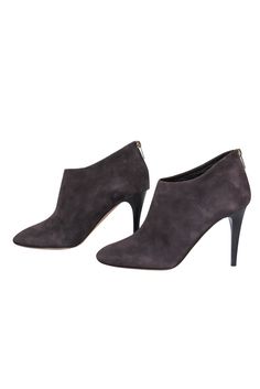 Step out in suede with these luxe boots from Jimmy Choo! The classic bootie is elevated (literally!) with a skinny heel and buttery soft suede design. Perfect for a night out during those crisp months. Pair with a sleek sweater dress and leather jacket for a luxe look that's sure to heat up the cold! Size 10 (EU 40) Suede upper Back zipper closure Round toe Skinny heel Leather sole and footbed w/ some wear Heel 4" Suede Ankle Boots With 4-inch Heel, Chic Suede Boots For Office, Elegant Suede Heeled Boots For Office, Elegant Ankle-high Suede Boots, Sleek Suede Boots For Fall, Elegant Office Heeled Boots In Suede, Chic 4-inch Heeled Suede Boots, Chic 4-inch Heel Suede Boots, Chic Suede Ankle Heeled Boots