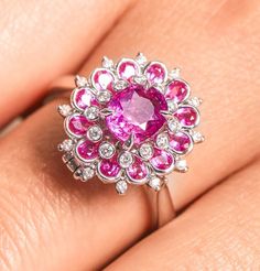 * Condition: Brand new * Center Stone: Natural Pink Sapphire, Oval Cut, approx 1.51ct * Side stones: Natural White Diamond round-cut (VS1 clarity with F color) * Metal Purity: 18K Solid White Gold (Optional) * Ring Weight: 5.33g (actual weight depend on the ring size) * Free DHL Express Shipping. * Attached with Certificate. * Each piece is made-to-order with care and special attention to detail. all items are made with conflict-free diamonds and gems. * The item will be gift wrapped and shipped Ballerina Engagement Ring, Pink Sapphire Diamond Ring, Luxury Jewelry Box, Ring Cluster, Bridal Diamond Jewellery, Buying An Engagement Ring, Purple Sapphire, 18k Gold Ring, White Gold Engagement Rings