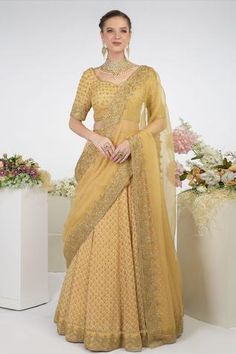 Gold lehenga highlighted with chikankari and zardozi hand embroidery. Comes with sweetheart front neckline blouse and silk organza dupatta.
Components:3
Embroidered
Neckline: Sweetheart
Sleeve Length:Half
Fabric:Blouse and Lehenga: Georgette; Dupatta: Silk Organza
Color:Gold
Embroidered blouse and dupatta
U-shaped back - Aza Fashions Gold Lehenga, Lehenga Blouse Designs, Lehenga Wedding, Gold Outfit, Lehenga Skirt, Gold Blouse, Blouse For Women, Embroidered Neckline, Organza Dupatta