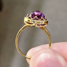 Fine Yellow Gold Amethyst Ring With Halo Setting, Fine Jewelry Yellow Gold Amethyst Ring With Halo Setting, Purple Pear-shaped Ring With Prong Setting, Formal Amethyst Pear-shaped Ring, Purple Pear-shaped Amethyst Ring With Prong Setting, Exquisite Amethyst Ring For Wedding, Exquisite Amethyst Ring For Anniversary, Pear-shaped Purple Amethyst Ring With Prong Setting, Elegant Gold Amethyst Ring With Halo Setting