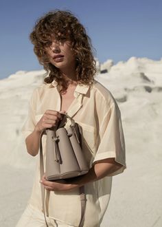 Polène | Bag - N°8 Mini - Grey Number Eight, Grey Crossbody Bag, White Crossbody Bag, Stylish Celebrities, Mini Bucket Bags, Knot Dress, Brown Shoulder Bag, Leather Handbags Crossbody, Taupe Color