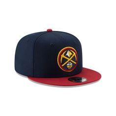 The Denver Nuggets Basic Two Tone 9FIFTY Snapback features an embroidered Nuggets logo at the front panels with a matching NBA Logoman above a snapback closure at the rear. Snapback Hats With Logo Patch For Fans, Fan Merchandise Snapback Hat With Logo Patch, Fitted Snapback Hat With Logo Patch For Fans, Flat Bill Hat With Logo Patch For Fans, Team-colored Snapback Hat With Logo Patch, Fan Merchandise Snapback Baseball Cap With Logo Patch, Baseball Cap Snapback With Logo Patch For Fans, Curved Brim Snapback Hat With Logo For Fans, Adjustable Snapback Hat With Logo For Fans