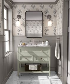 a bathroom with two sinks and a large mirror above the sink is shown in this image