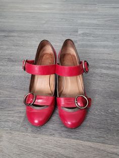 "Vintage women`s raspberry red leather strappy pumps. Bright color mary jane shoes with round toe and chunky, cone heels. EU size 38. Made in Spain. Chunky heeled pumps with frontal straps and adjustable straps on the sides.  condition: normal, bit used vintage. Without serious damages. Some slight scratches on the toe, back and heel ends.  measurements: outsole length 27 cm / 10.5\" in heels height 7,8 cm / 3\" in bottom sole width in widest place 8,2 cm / 3.2\" in size:   EU 38 LABELED size, e Cone Heels, Heeled Pumps, Strappy Pumps, Womens Mary Janes, Raspberry Red, Mary Jane Shoes Womens, Jane Shoes, Vintage Women, Mary Jane Shoes