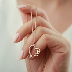 "Title: Heart Infinity Necklace, Minimal Heart Necklace, Valentines Necklace. * Material : Sterling Silver 925. * Finish: 925 Sterling Silver. * All jewelries that we sell are handmade. * This necklace is a great way to show your love and It will also look great with your outfits. * Our chain lengths are 16\", 17\", 18\" extender. * Our processing time is between 5 to 8 business days. It depends on pick seasons and busyness. IMPORTANT: **Please don't forget to customize this item with materials( Infinity Heart Pendant, Sterling Silver Infinity Heart Necklace For Anniversary, Infinity Necklace For Mom On Valentine's Day, Heart Charm Infinity Necklace For Valentine's Day, Infinity Heart Charm Necklace For Valentine's Day, Infinity Heart Necklace In Sterling Silver For Gift, Sterling Silver Infinity Heart Necklace As Gift, Sterling Silver Infinity Necklace For Valentine's Day, Rose Gold Sterling Silver Jewelry With Heart Beads