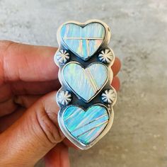 Navajo Signed Sterling Silver & Lab Opal Hearts Ring! Condition: Brand New, Handmade! Stamped Sterling And Signed An! Incredible! See Photos! Retail $360! Size: 8 2” H X 7/8” W! This Is Only For One Ring, The Other Items Are Up Separately! I Have Multiple Native American, Navajo, Zuni, Taxco, Antique, Vintage, And Other Designer Items If You Want To Check Out My Other Listings! Sorry, No Trades! Same Day Shipping When Possible! New Items Posted Every Week! Any Questions, Let Me Know! Southwestern Silver Heart-shaped Jewelry, Southwestern Style Nickel-free Silver Rings, Opal Heart Ring, Nickel-free Silver Southwestern Rings, Southwestern Style Blue Nickel-free Rings, Southwestern Style Nickel-free Sterling Silver Rings, Silver Lab, Native American Jewelry Navajo, Designer Items