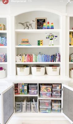 a white bookcase filled with lots of books