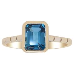 Stunning, timeless and classy eternity Unique Ring. Decorate yourself in luxury with this Gin & Grace Ring. The 14K Yellow Gold jewelry boasts with Emerald-Cut London Blue Topaz (1 pcs) 1.77 carat accent stones for a lovely design. This Ring is weight 2.23 grams. Crafted with 14K Yellow Gold, this delicate Ring is polished to a high finish shine. Unique Luxury Yellow Gold Topaz Ring, Luxury Topaz Timeless Jewelry, Yellow Gold Blue Topaz Baguette Cut Ring, Luxury 14k Gold Topaz Ring With Accent Stones, Yellow Gold Baguette Cut Blue Topaz Ring, Fine Jewelry Blue Topaz Rectangular Rings, Timeless Yellow Gold Topaz Ring With Accent Stones, Fine Jewelry Topaz Ring With Rectangular Stone, Modern Yellow Gold Topaz Ring With Center Stone