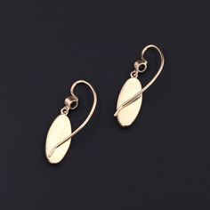 Add a touch of intrigue to any ensemble with these unique insect earrings! To create these earrings, our jeweler carefully cut antique shibayama game pieces (circa 1880) into an oval shape, mounted them in 14k gold, and added 14k ear wires and sapphire surmounts. Each earring measures 1 inch from the top of the ear wire to bottom by 0.3 inches wide, and they are in excellent condition. Materials: Sapphire, Gold. Victorian Oval Pierced Earrings, Victorian Jewelry With Oval Matching Earrings, Yellow Gold Oval Pierced Earrings, Heirloom Oval Gold Earrings, Oval Yellow Gold Pierced Earrings, Oval Yellow Gold Earrings, Elegant 14k Gold Oval Link Earrings, Antique Brass Oval Earrings, Antique Oval Brass Earrings