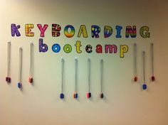 there is a sign on the wall that says keyboardoaring botampp and many pins are stuck to it