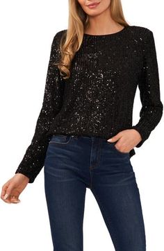 Splash some sparkle into a fun or fancy look with this twinkling top. 23" length ( size Medium) Jewel neck Long sleeves 95% polyester, 5% spandex Hand wash, dry flat Imported Twist Front Top, Sequin Blouse, Kids Trend, Sequin Top, Oversized Sweatshirt, Back To Black, Kids Jacket, Long Sleeve Top, Women Long Sleeve