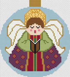 a cross stitch pattern with an angel on it