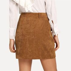 This sassy but sweet zippered front mini is perfection. Featuring front pockets and a soft corduroy feel this skirt pairs perfectly with tops, bodysuits or sweaters; from season-to-season you will want this skirt in the front of your wardrobe. Made with a polyester and nylon blend for comfort and style. Fitted Corduroy Mini Skirt, Solid Mini Skirt For Fall, Trendy Corduroy Mini Skirt, Fall Mini Skort With Pockets, Fall Mini Length Skort With Pockets, Trendy Fall Pencil Mini Skirt, Trendy Fall Skort With Pockets, Solid Color Fall Mini Skirt, Casual Skort With Side Zipper