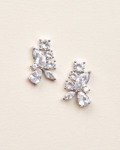 Dainty & elegant, these cluster stud cubic zirconia earrings are a perfect way to add some shine for any special occasion. Cubic zirconia .5" x .75" long Hypoallergenic, lead-free & nickel-free Style #4392 Wedding Day Earrings, Bridal Drop Earrings, Bridal Earrings Drop, Luxe Jewelry, Floral Studs, Crystal Dangle Earrings, Popular Jewelry, Sparkle Earrings, Silver Jewelry Fashion