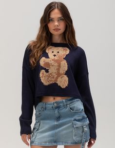 Rsq Icon Bear Pullover Sweater. Featuring A Charming Bear Graphic On The Front, This Sweater Combines Comfort With A Fun, Iconic Design. Made From Soft, High-Quality Fabric, It Offers A Relaxed Fit That's Perfect For Layering During Cooler Months. Ribbed Crew Neckline. Cuffed Long Sleeves And Hem. Boxy And Cropped Fit. 100% Acrylic. Machine Wash. Imported. Model Is Wearing A Size Small. Model Measurements:height: 5'8" Bust: 31"waist: 23.5"hips: 34.5" Cute Knit Tops For Fall, Graphic Print Knit Tops For Fall, Graphic Sweater Outfit, Wwe T Shirts, Flannel Sweatshirt, Graphic Sweaters, Bear Graphic, Bear Shirt, Girls Blouse