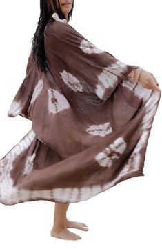 Perfect for poolside hangs or kicking it in the sand, this tie-dye duster is the perfect accessory to add to your sun-loving wardrobe. 57" length (size One Size) Open front Short sleeves 100% viscose Hand wash cold, line dry Imported Model stats: 5'10", 32" bust, 25" waist, 36" hip. Model is wearing size One Size. Casual Brown Beach Cover-up, Spring Tie Dye Kimono For Beach, Spring Beach Tie-dye Kimono, Spring Beach Tie Dye Kimono, Casual Tie Dye Kimono For Summer, Summer Tie Dye Kimono For Beach, Spring Tie Dye Kimono For Beach Cover-up, Spring Vacation Tie Dye Kimono, Bohemian Oversized Cover-up For Poolside