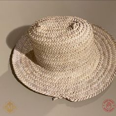 This Straw Hat sun are 100% handmade by artisans in Northern Morocco. and has been completely handmade. The dried palm leaf hat made from wild palm leavesare by free hand, with the straw Hat Natural palm. This Hand-Woven straw hats. Perfect for sunning your buns but keeping your pretty face shaded this summer! Features : Material : Harvested from the Doum palm Color : As Picture Size: Approx. 40 to 50 cm / 15.7 to 19.6 Inches Shap : Rounded Brand : Grand Moroccan Bazaar Condition : New Ethnic and traditional look Can be reshaped when wet. Ideal for the beach or working in the garden, a decoration on the wall. NOTE : Due to the nature of artisanship, a small variation in color, size, or design may occur. which make them even more beautiful and charming. Leaf Hat, Your Pretty, Straw Hats, Free Hand, Palm Leaf, Hat Making, Picture Sizes, Straw Hat, Pretty Face