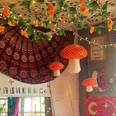 the ceiling is decorated with orange flowers and mushrooms