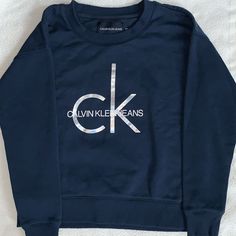 Calvin Klein Navy Crew Neck Sweatshirt. Never Worn! Calvin Klein Sweatshirt, Womens Calvin Klein, Navy Tops, T Shirt Design, Shirt Design, Calvin Klein, Crew Neck Sweatshirt, Tshirt Designs, Sweatshirts Hoodie