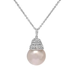 This feminine pendant features a lustrous 16.5 mm South Sea pearl with 0.40 carats of VS clarity round diamonds. The pearl is lustrous and uniform in surface color all around. A royal design set in 18K white gold. Chain Length: 18 inches Pendant Length: 2 1/8 inches Pendant Width: ½ inch Formal White Gold Diamond Necklace With Detachable Pendant, Formal Diamond Necklace With Detachable Round Pendant, Luxury White Gold Pearl Necklace For Evening, Elegant Diamond Necklace With Detachable Cubic Zirconia Pendant, Elegant Round Diamond Necklace With Detachable Pendant, Silver Diamond Pearl Necklace For Evening, Luxury Diamond Necklace With Pearl Drop, Elegant Formal Pearl Necklace With Diamond Accents, Luxury Pearl Pendant Necklace For Formal Occasions