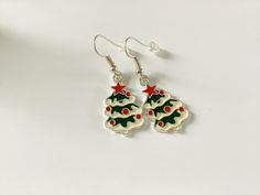 Silver colored Christmas tree earrings, You can choose from three different closures: Hook, Ring, Pin closure. For more items see: https://www.etsy.com/nl/shop/jewelsbykiara Greetings Kiara Festive Christmas Jewelry With Matching Earrings, Christmas Jewelry Gift With Matching Earrings, Christmas Jewelry Gift Set With Matching Earrings, Christmas Jewelry Set As Gift With Matching Earrings, Handmade Round Christmas Earrings, Nickel-free Jewelry For Festive Holidays, Nickel-free Christmas Party Jewelry, Nickel-free Jewelry For Festive Holiday, Holiday Festive Nickel-free Jewelry