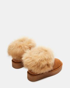 Effortlessly elevate your style with our CHILLY platform faux fur ankle boot. Designed for comfort and sophistication, this bootie is the perfect addition to any outfit. With its elegant platform and cozy faux fur, you'll experience a luxurious feel with every step. 1.75 inch heel height 15 inch shaft circumference 4.25 inch shaft height Microsuede and faux fur upper material Faux fur lining Faux fur sock Synthetic sole Imported Fur Ankle Boots, Women's Booties, Platform Ankle Boots, Womens Boots Ankle, Elevate Your Style, Chestnut, Bootie, Faux Fur, Heel Height