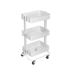 a white cart with three trays on it