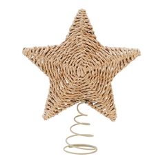 a wicker star decoration hanging from a wire on a white background with a spiral cord in the foreground