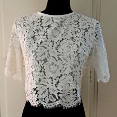 Crop White Lace Blouse/ Top New Without A Tag Never Worn Size: S/M Very Elegant Top, Nice To Wear With Jeans Or Skirt Measurements: Lenght: Approximately 15-16" From Back To Hem. Chest: Approximately 19-19.5" Back Zipper Closure Fitted Cropped Blouse With Lace Top, Fitted Cropped Lace Top Blouse, Fitted Lace Top Cropped Blouse, Fitted Lace Top For Day Out, Fitted Cropped Lace Blouse, Fitted Lace Cropped Blouse, Fitted Crew Neck Blouse With Lace Top, Fitted Blouse With Lace Top And Crew Neck, Elegant Spring Lace Crop Top