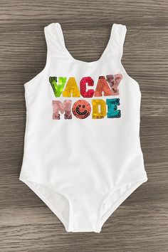 White & rainbow sequin design adds a bright pop to her summer swimwear Swimsuits feature a one-piece design with a scoop neck & back Ultra-soft, stretchy fabric keeps the fit light & comfy Twinning is winning! You and your little one will look so cute on the beach or poolside in our "Vacay Mode" White Sequin Swimsuits. Made from a soft & lightweight fabric, the swimsuit is designed to keep her comfortable both in and out of water. Featuring a rainbow sequin design, she can pair this fun swimsuit White Playful Swimwear For Vacation, Playful White Tankini For Beach Season, Playful White Swimwear For Summer, Playful White One-piece Swimwear, White Vacation Party Swimwear, Fun White Sleeveless Swimwear, Fun White Swimwear, Fun White Stretch Swimwear, Playful Summer Swimwear For Holiday