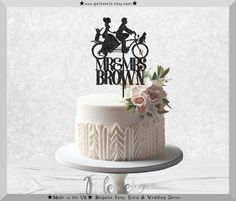 a wedding cake topper that says mr and mrs brown