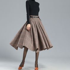 "This winter wool skirt is a classic piece of tailoring that will see you through rain or shine. It is cut with a flattering flared skirt to give you a wonderful shape. The winter skirt is perfect classic styling and ends at the ankle. This is a versatile skirt that you'll wear again and again. DETAILS: * 30% wool, 30% fiber, 40% polyester * fully satiny liner * Two side pockets * Right zip closure * has belt loops to keep everything in place * Plus size full skirt * Perfect for Winter, autumn * Women Tartan Skirt, Winter Wool Skirt, Midi Wool Skirt, High Waist Pleated Skirt, Plaid Wool Skirt, Skirt Wool, Academia Style, Tartan Skirt, Pleated Long Skirt